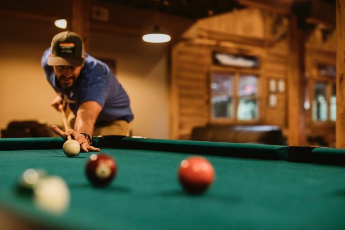 a man playing pool