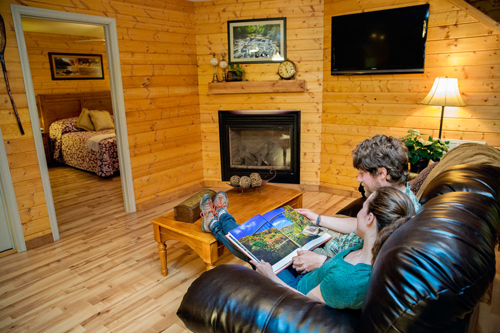 two people sitting inside a cabin