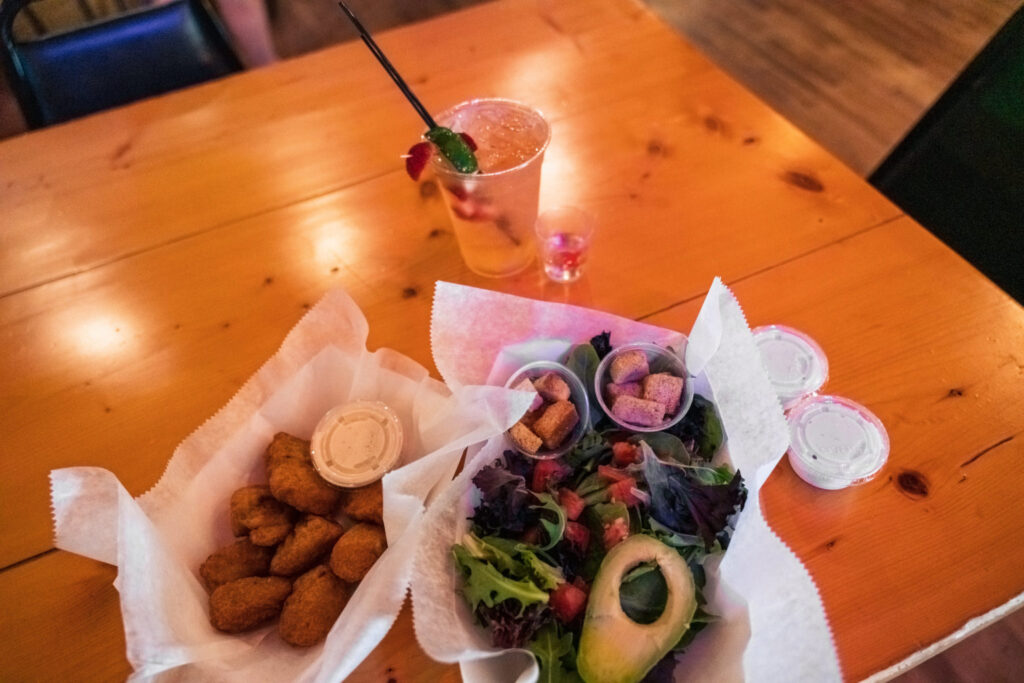 food on a table including a salad