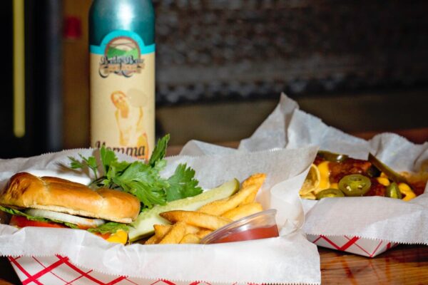 burger and nachos on the table