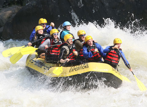 rafters paddle to navigate the rapids River Expeditions West Virginia