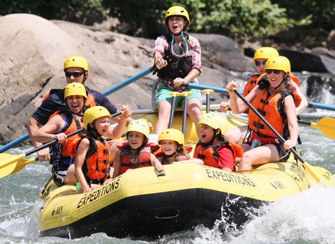 kids and parents excited to see what's ahead on the river during their trip with River Expeditions West Virginia