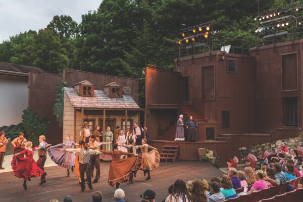 a group of performers at a play