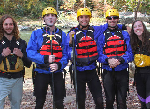 rafters pose with two guides during their whitewater trip at River Expeditions West Virginia