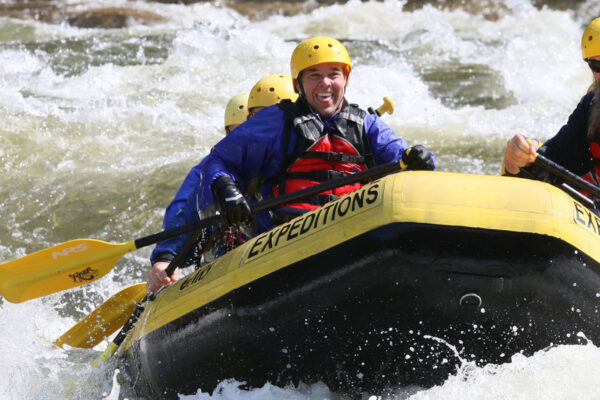 group of male friends enjoy their Gauley River rafting trip River Expeditions West Virginia