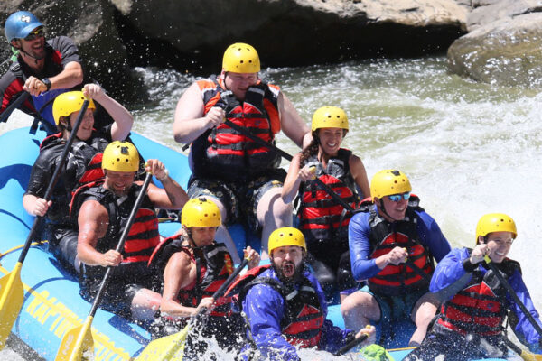 rafters and guide navigate intermediate rapids River Expeditions West Virginia