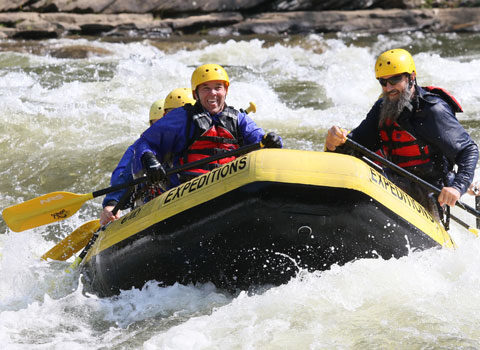 rafters and guide navigate intermediate rapids River Expeditions West Virginia